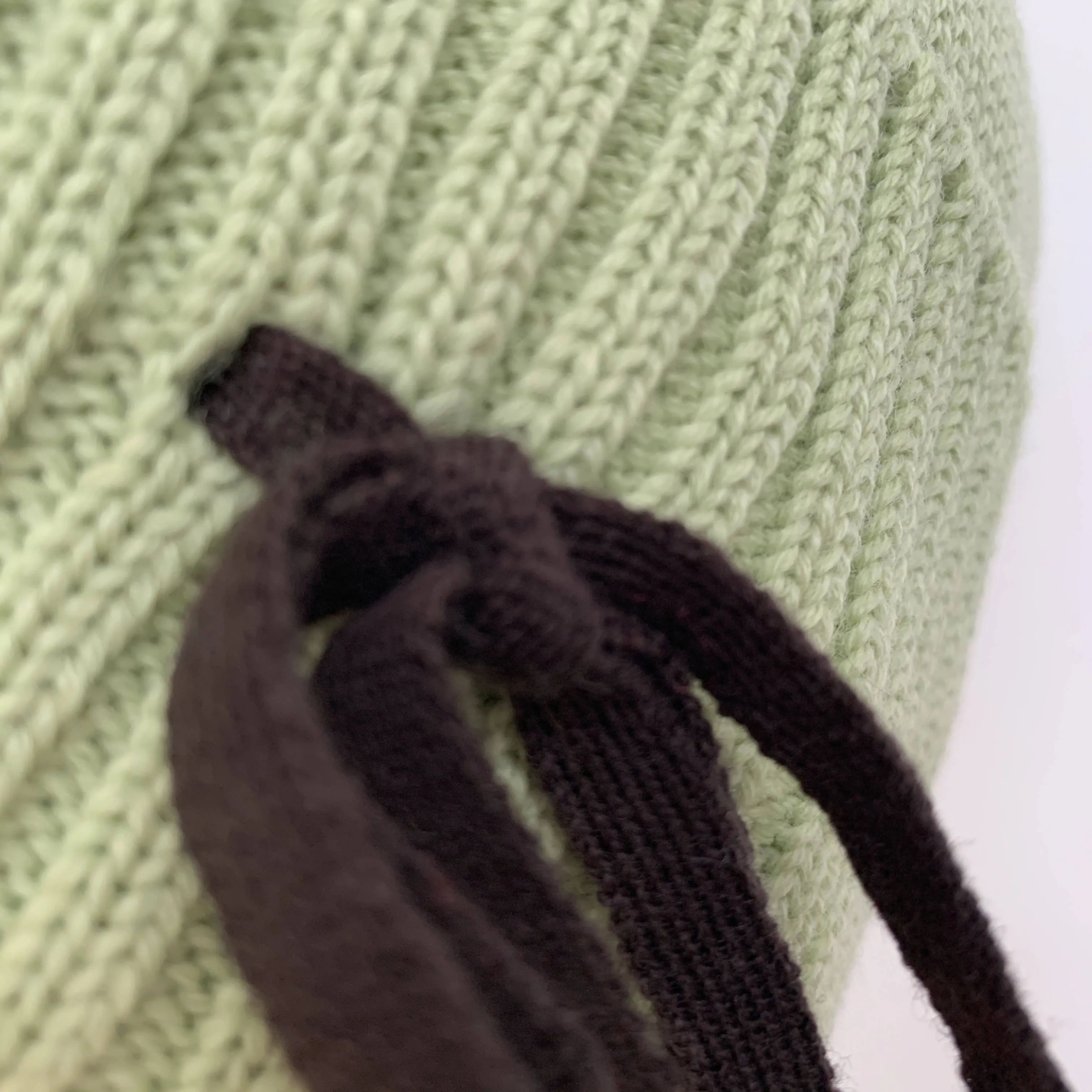Vintage mint green wool beanie by Miu Miu made in Italy with black bow detail