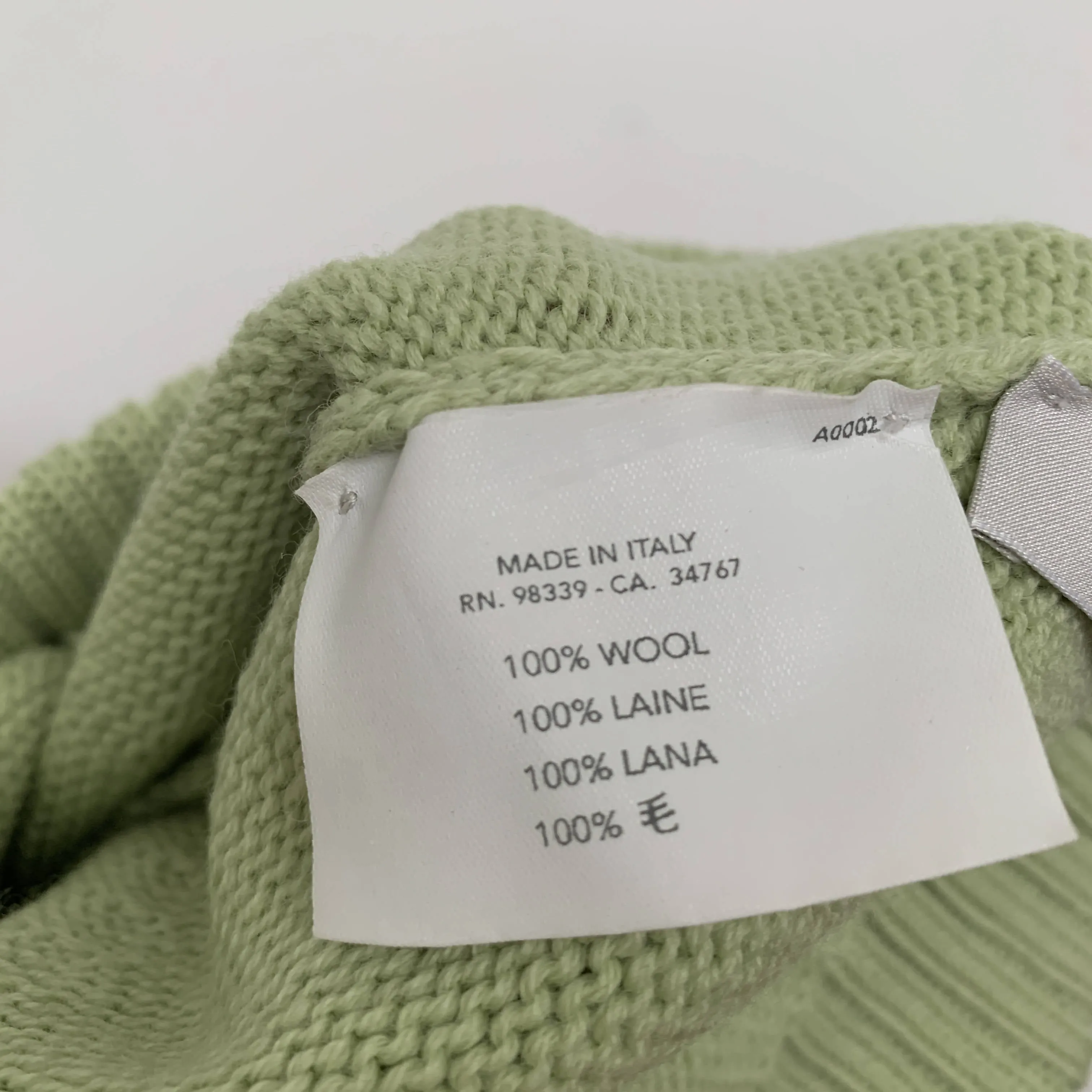 Vintage mint green wool beanie by Miu Miu made in Italy with black bow detail